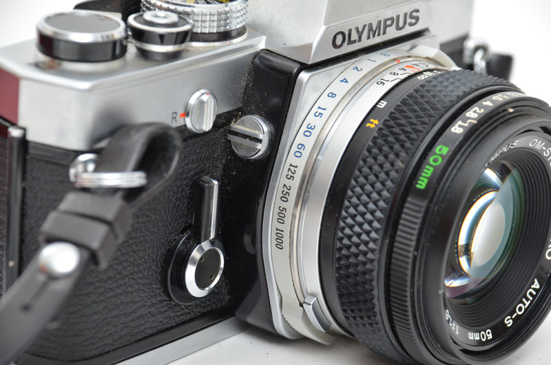 Used Olympus OM-1 SLR camera with Olympus Zuiko Auto-s 50mm f/1.8 lens –  Cambrian Photography